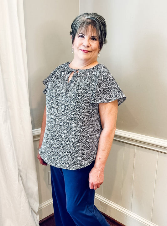 Blue and white leopard print top